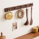 Toilet room wall-mounted storage rack