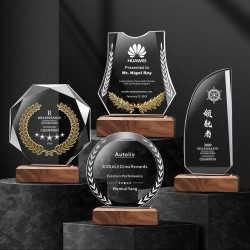 Custom solid wood and crystal trophies, customized medals, honor plaques, employee recognition awards, annual meeting souvenirs, and award presentation items.