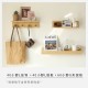 Toilet room wall-mounted storage rack