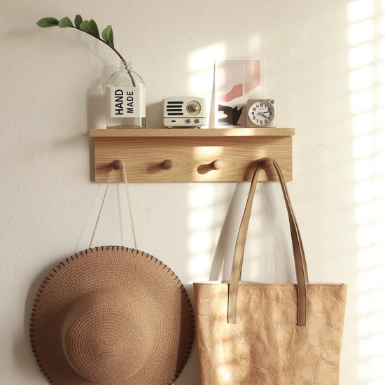 Toilet room wall-mounted storage rack