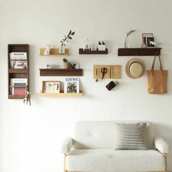 Toilet room wall-mounted storage rack