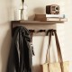 Toilet room wall-mounted storage rack