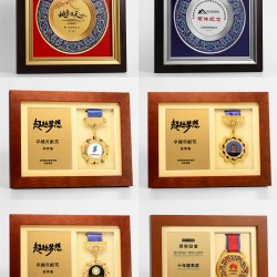 Custom-made medals, metal and wooden authorized dealer plaques, honor certificates, retirement and military discharge memorabilia